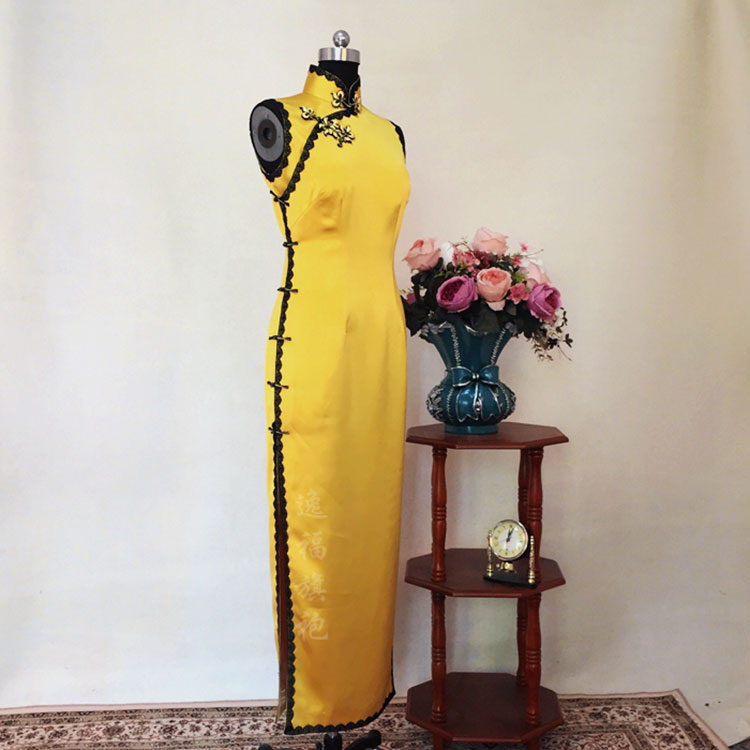 Yellow long qipao dress with black trim