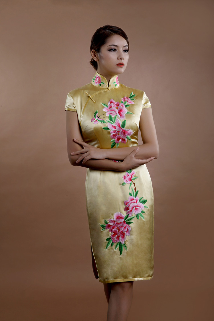 Light golden cheongsam with peonys embroidery Light golden cheongsam with peonys embroidery
