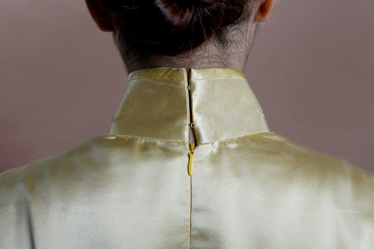 Light golden cheongsam with peonys embroidery Light golden cheongsam with peonys embroidery