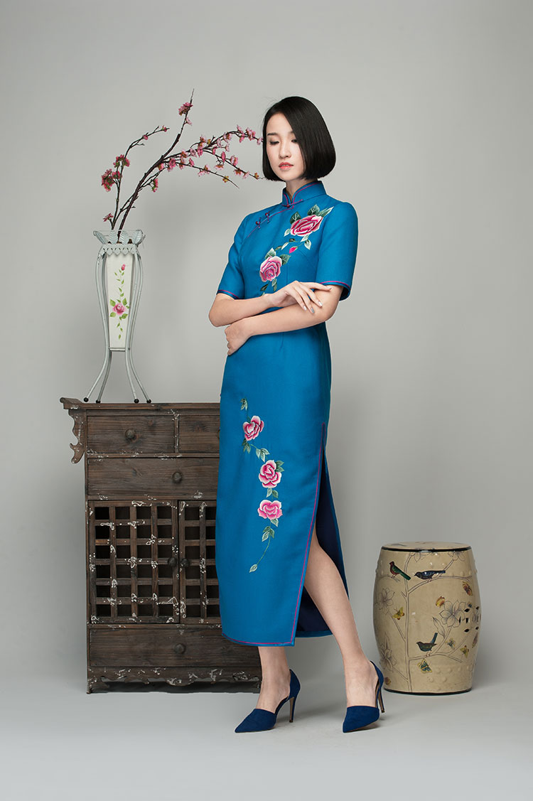 Lake blue cashmere dress with embroidered roses