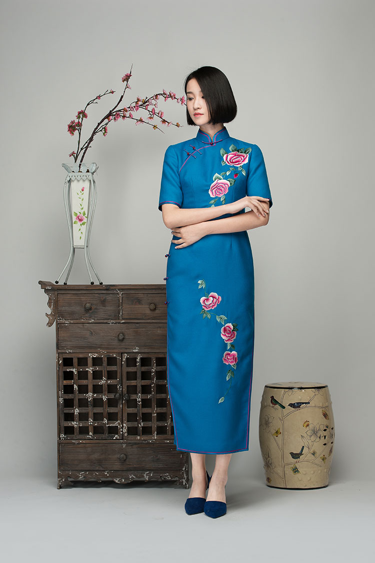 Lake blue cashmere dress with embroidered roses