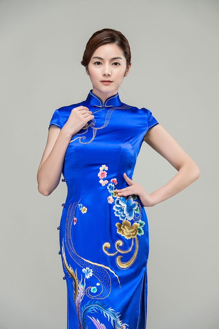 Sapphire blue silk cheongsam with golden phoenix Sapphire blue silk cheongsam with golden phoenix