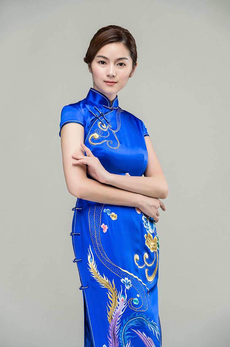 Sapphire blue silk cheongsam with golden phoenix Sapphire blue silk cheongsam with golden phoenix